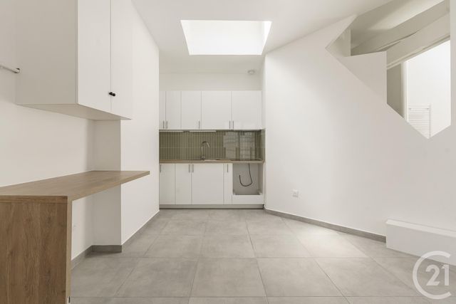 Appartement Loft à vendre - 2 pièces - 77.97 m2 - PARIS - 75011 - ILE-DE-FRANCE - Century 21 Chaumont-Laumière